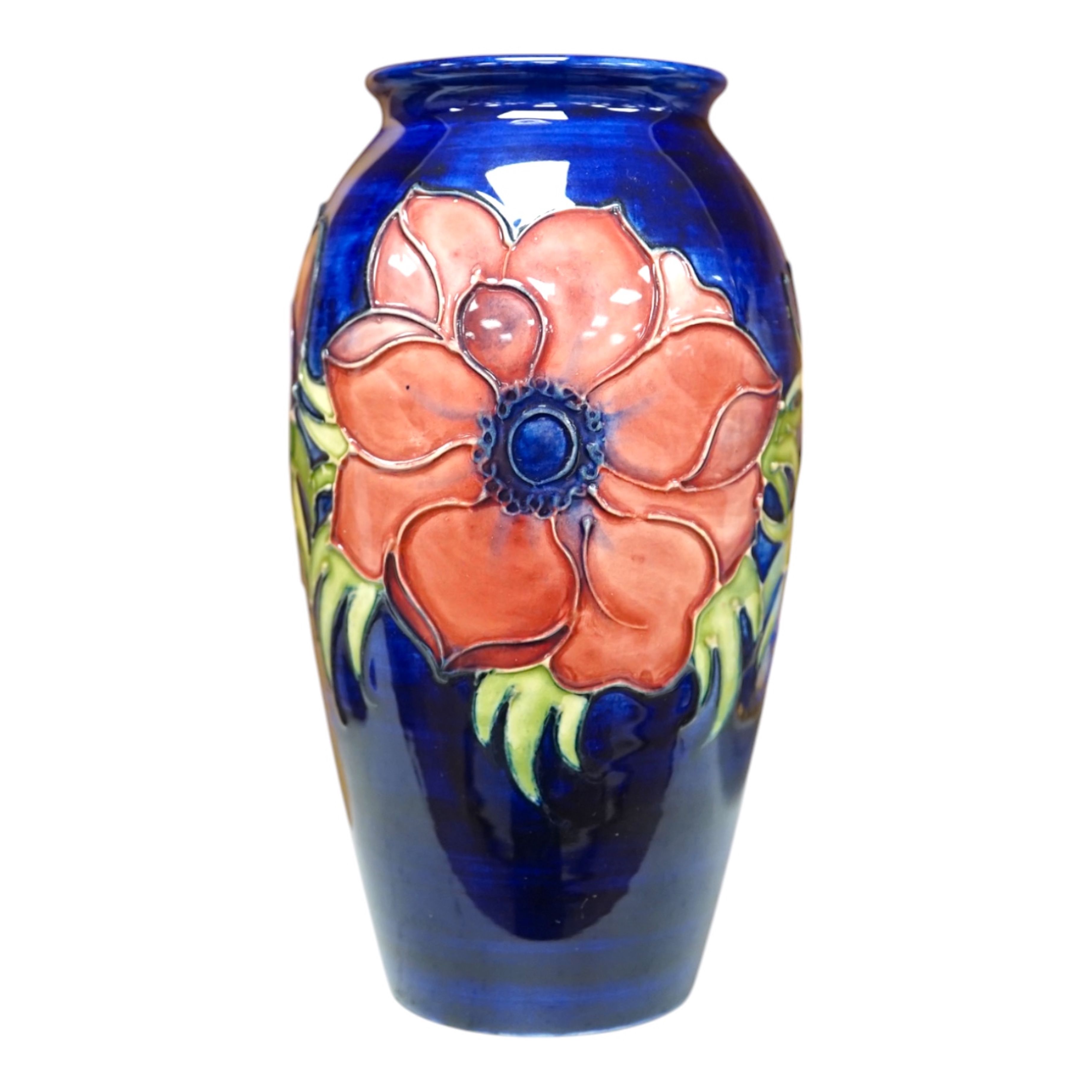 A Moorcroft anemone pattern vase, 18.5cm tall. Condition - good